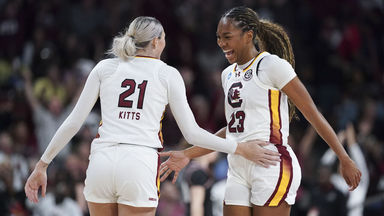 COLUMBIA, SOUTH CAROLINA - MARCH 23: Bree Hall #23 and Chloe Kitts #21 of the South Carolina Gamecocks celebrate a Kitt's three-pointer during the second half of a second round game against the Indiana Hoosiers in the NCAA Women's basketball tournament on March 23, 2025 in Columbia, South Carolina. The South Carolina Gamecocks won 64-53.