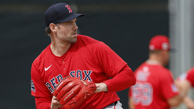 Fort Myers, FL - February 19: Boston Red Sox pitcher Adam Ottavino throws during spring training at JetBlue Park.