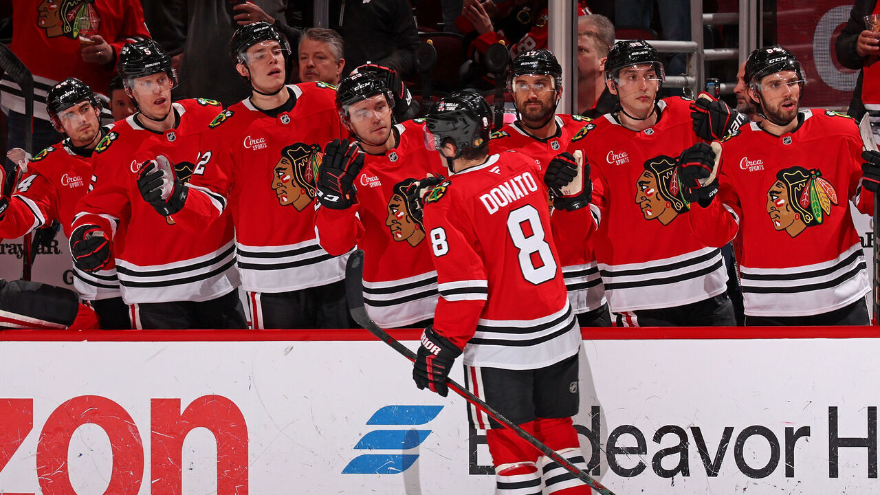 CHICAGO, ILLINOIS - MARCH 23: Ryan Donato #8 of the Chicago Blackhawks celebrates with teammates after scoring his second goal of the game against the Philadelphia Flyers in the second period at the United Center on March 23, 2025 in Chicago, Illinois.