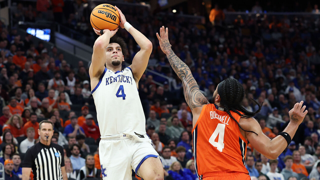 MILWAUKEE, WISCONSIN - MARCH 23: Koby Brea #4 of the Kentucky Wildcats takes a shot over Kylan Boswell #4 of the Illinois Fighting Illini during the first half in the second round of the NCAA Men's Basketball Tournament at Fiserv Forum on March 23, 2025 in Milwaukee, Wisconsin.