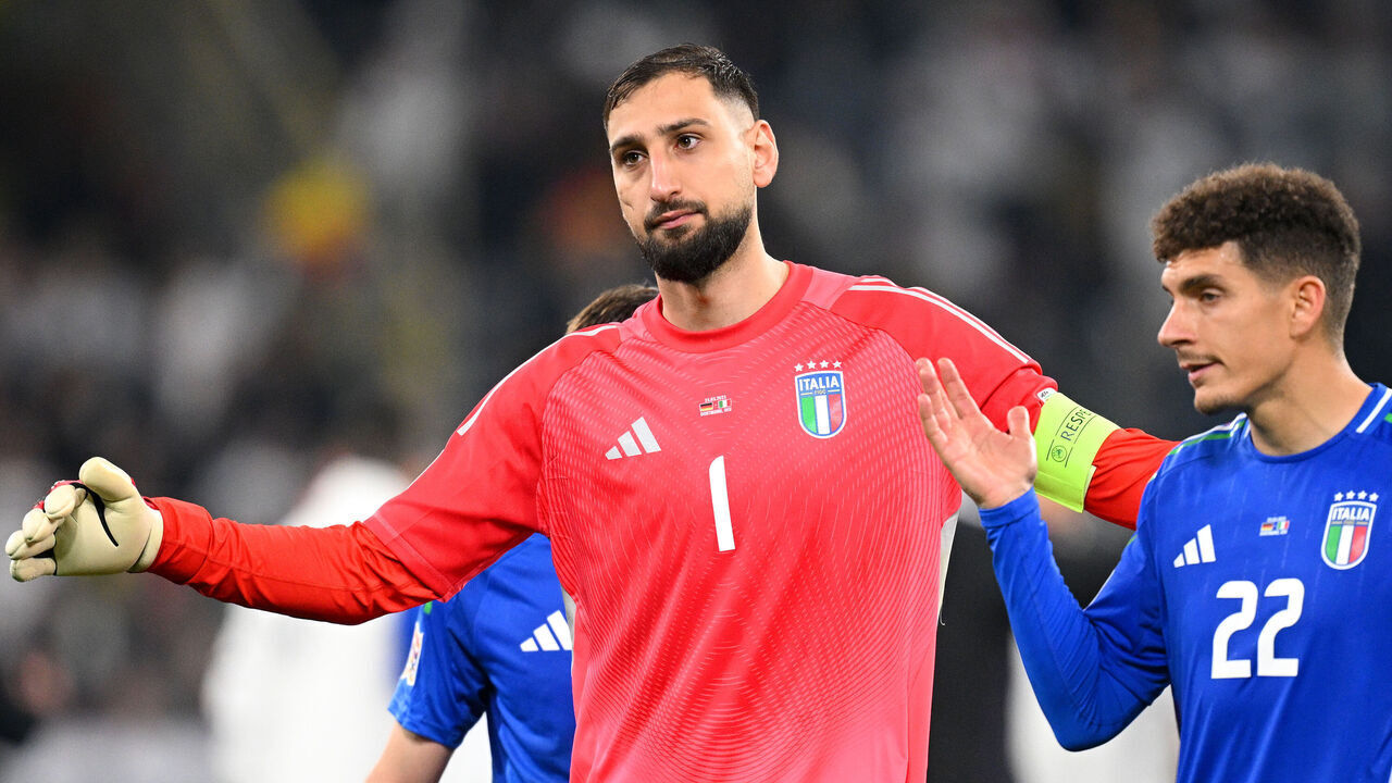 DORTMUND, GERMANY - MARCH 23: Gianluigi Donnarumma and Giovanni Di Lorenzo of Italy looks dejected after the UEFA Nations League Quarterfinal Leg Two match between Germany and Italy at Football Stadium Dortmund on March 23, 2025 in Dortmund, Germany.