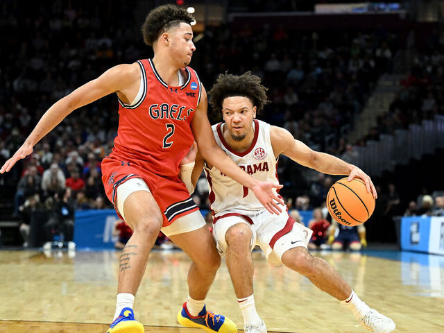 CLEVELAND, OHIO - MARCH 23: Mark Sears #1 of the Alabama Crimson Tide dribbles against Jordan Ross #2 of the Saint Mary's Gaels during the second half in the second round of the NCAA Men's Basketball Tournament at Rocket Mortgage Fieldhouse on March 23, 2025 in Cleveland, Ohio.