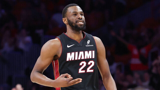 MIAMI, FLORIDA - MARCH 23: Andrew Wiggins #22 of the Miami Heat celebrates during the third quarter of the game against the Charlotte Hornets at Kaseya Center on March 23, 2025 in Miami, Florida.