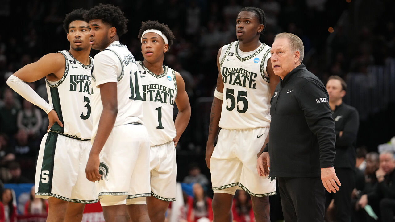 CLEVELAND, OHIO - MARCH 23: (Left to Right) Jaden Akins #3, Jase Richardson #11, Jeremy Fears Jr. #1, Coen Carr #55 and head coach Tom Izzo of the Michigan State Spartans look on during the second half of the second round of the 2025 NCAA Men's Basketball Tournament against the New Mexico Lobosat Rocket Mortgage Fieldhouse on March 23, 2025 in Cleveland, Ohio.