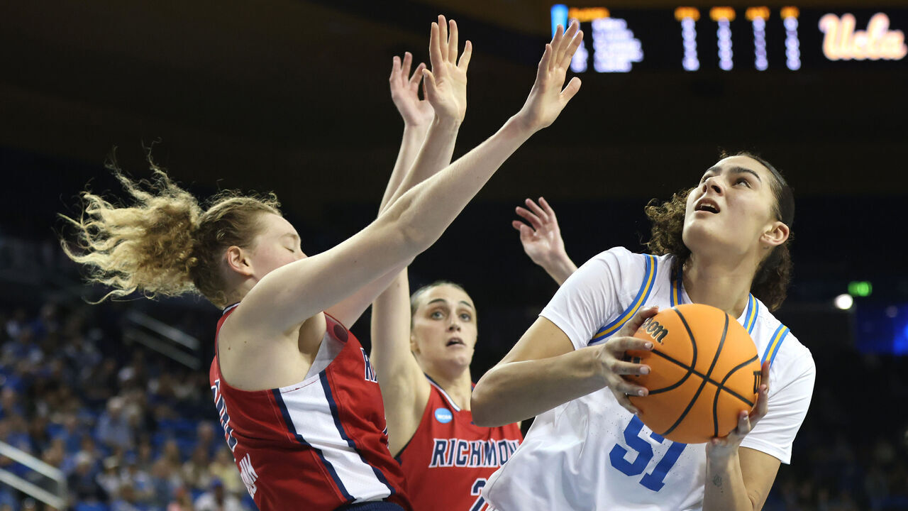 LOS ANGELES, CALIFORNIA - MARCH 23: Lauren Betts #51 of the UCLA Bruins shoots as Addie Budnik #20 of the Richmond Spiders defends in the second half during the second round of the NCAA Women's Basketball Tournament at UCLA Pauley Pavilion on March 23, 2025 in Los Angeles, California.