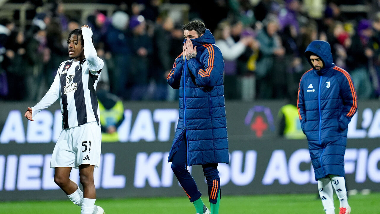 Samuel Mbangula of Juventus FC and Carlo Pinsoglio of Juventus FC leave the pitch dejected at the end of the Serie A Enilive match between ACF Fiorentina and Juventus FC at Stadio Artemio Franchi on March 16, 2025 in Florence, Italy.