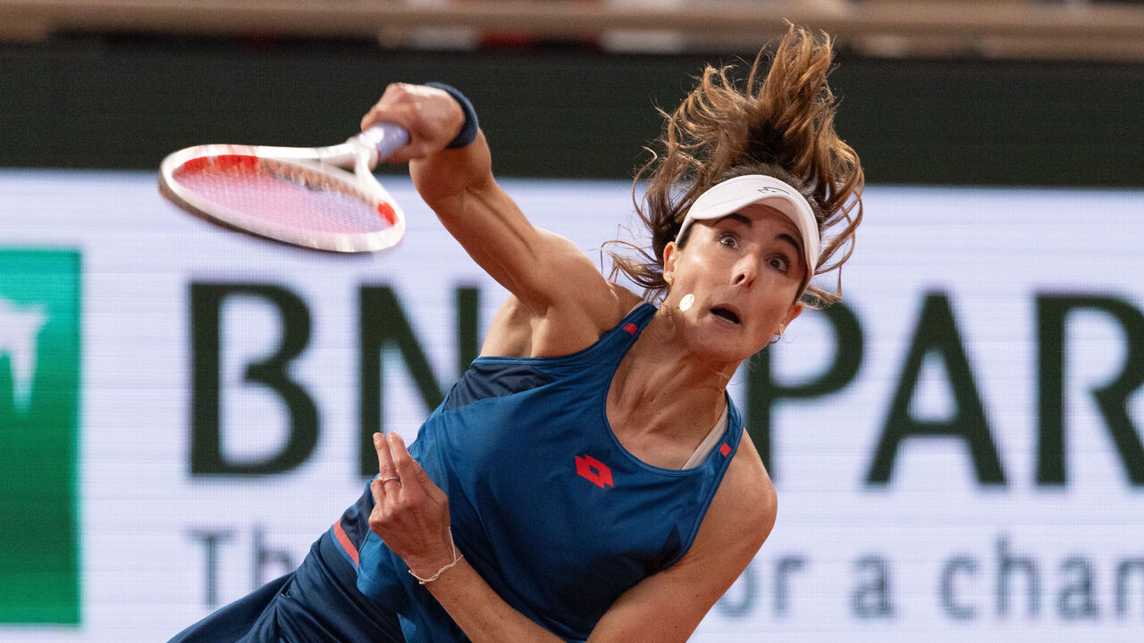 PARIS, FRANCE - MAY 28: Alize Cornet of France serves against Zheng Qinwen of People's Republic of China in the Women's Singles first round match on Day Three of the 2024 French Open at Roland Garros on May 28, 2024 in Paris, France