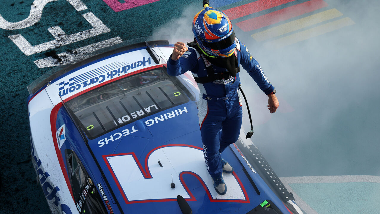 HOMESTEAD, FLORIDA - MARCH 23: Kyle Larson, driver of the #5 HendrickCars.com Chevrolet, celebrates after winning the NASCAR Cup Series Straight Talk Wireless 400 at Homestead-Miami Speedway on March 23, 2025 in Homestead, Florida.