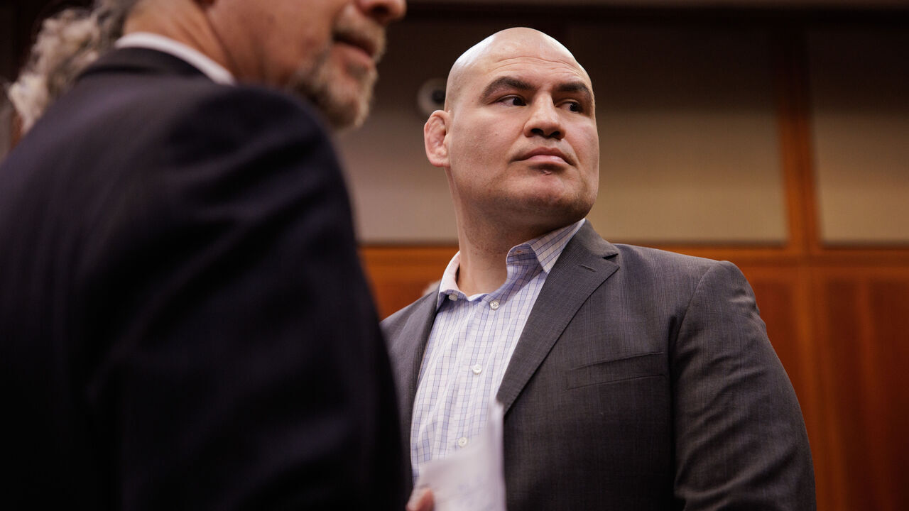 SAN JOSE, CALIFORNIA - NOVEMBER 21: Cain Velasquez, right, appears for his arraignment with attorney Edward Sousa, who appeared with him, at the Santa Clara County Hall of Justice on Monday, Nov. 21, 2022, in San Jose, Calif. Velasquez, the former UFC champion based out of San Jose, was charged with shooting at a man accused of molesting his child.