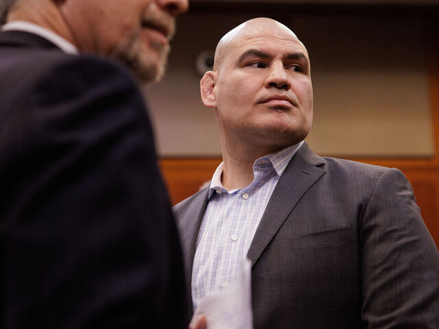 SAN JOSE, CALIFORNIA - NOVEMBER 21: Cain Velasquez, right, appears for his arraignment with attorney Edward Sousa, who appeared with him, at the Santa Clara County Hall of Justice on Monday, Nov. 21, 2022, in San Jose, Calif. Velasquez, the former UFC champion based out of San Jose, was charged with shooting at a man accused of molesting his child.