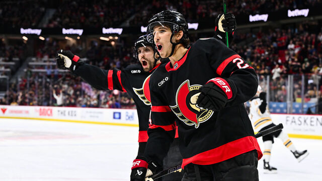 OTTAWA, CANADA - MARCH 13: Dylan Cozens #24 of the Ottawa Senators celebrates a goal by teammate Drake Batherson #19 (not pictured) during the second period against the Boston Bruins at Canadian Tire Centre on March 13, 2025 in Ottawa, Ontario, Canada. The Ottawa Senators defeated the Boston Bruins 6-3.