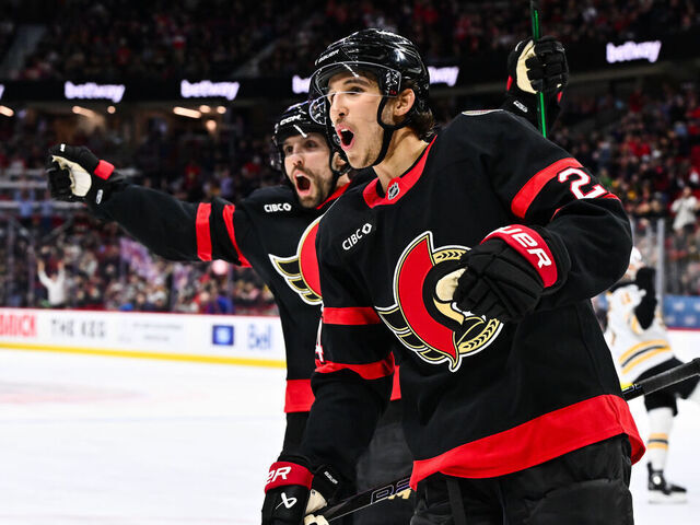 OTTAWA, CANADA - MARCH 13: Dylan Cozens #24 of the Ottawa Senators celebrates a goal by teammate Drake Batherson #19 (not pictured) during the second period against the Boston Bruins at Canadian Tire Centre on March 13, 2025 in Ottawa, Ontario, Canada. The Ottawa Senators defeated the Boston Bruins 6-3.