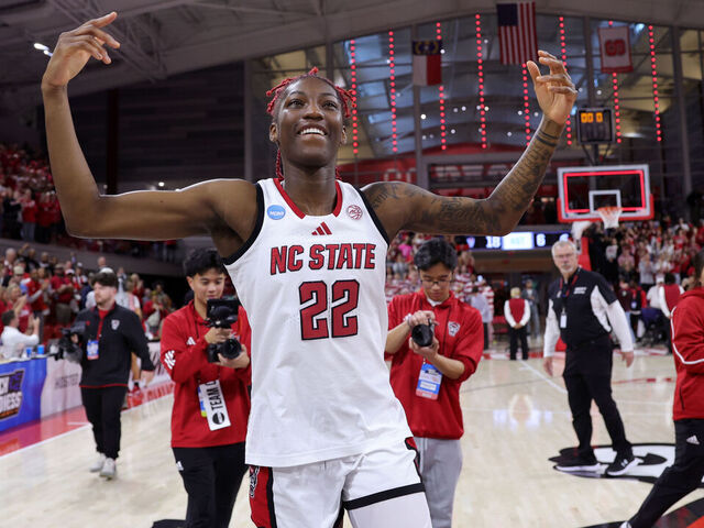 RALEIGH, NORTH CAROLINA - MARCH 24: Saniya Rivers #22 of the NC State Wolfpack celebrates following their win against the Michigan State Spartans during the Second Round of the 2025 NCAA Women's Basketball Tournament held at Reynolds Coliseum on March 24, 2025 in Raleigh, North Carolina.