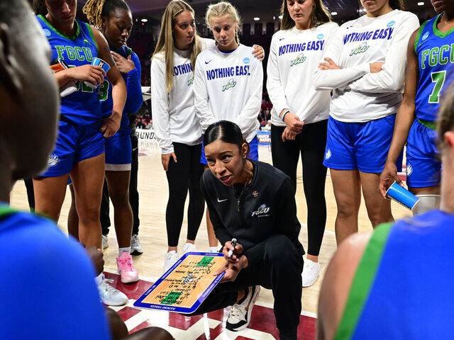 NORMAN, OKLAHOMA - MARCH 22: Head coach Chelsea Lyles of the Florida Gulf Coast University Eagles gives intructions during the First Round of the 2025 NCAA Women's Basketball Tournament held at Lloyd Noble Center on March 22, 2025 in Norman, Oklahoma.
