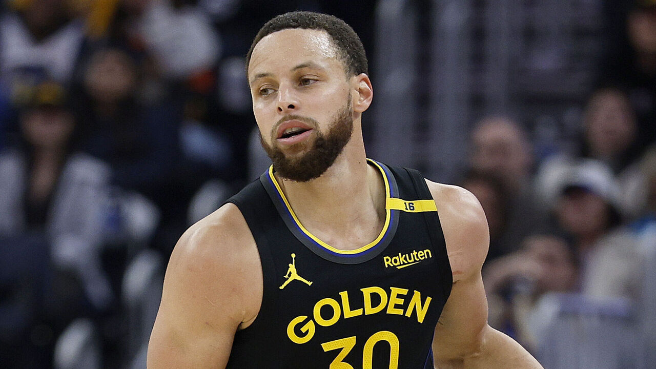 SAN FRANCISCO, CALIFORNIA - MARCH 20: Stephen Curry #30 of the Golden State Warriors dribbles the ball up court against the Toronto Raptors during the first half of an NBA basketball game at Chase Center on March 20, 2025 in San Francisco, California.