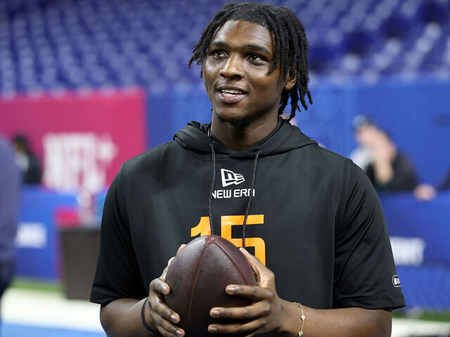 INDIANAPOLIS, INDIANA - MARCH 01: Cameron Ward #QB15 of Miami-FL looks o during the NFL Scouting Combine at Lucas Oil Stadium on March 01, 2025 in Indianapolis, Indiana.