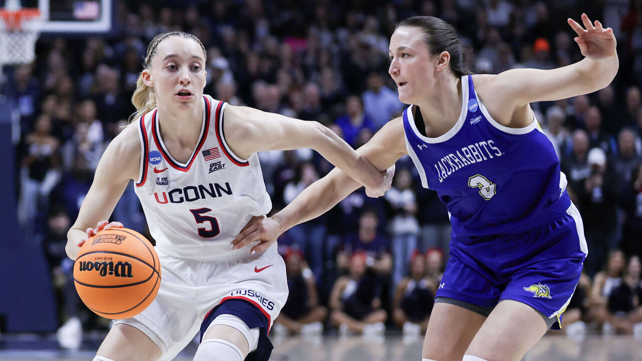 STORRS, CONNECTICUT - MARCH 24: Paige Bueckers #5 of the UConn Huskies drives towards the rim while being defended by Madison Mathiowetz #3 South Dakota State Jackrabbits during the Second Round of the 2025 NCAA Women's Basketball Tournament held at Harry A. Gampel Pavilion on March 24, 2025 in Storrs, Connecticut.