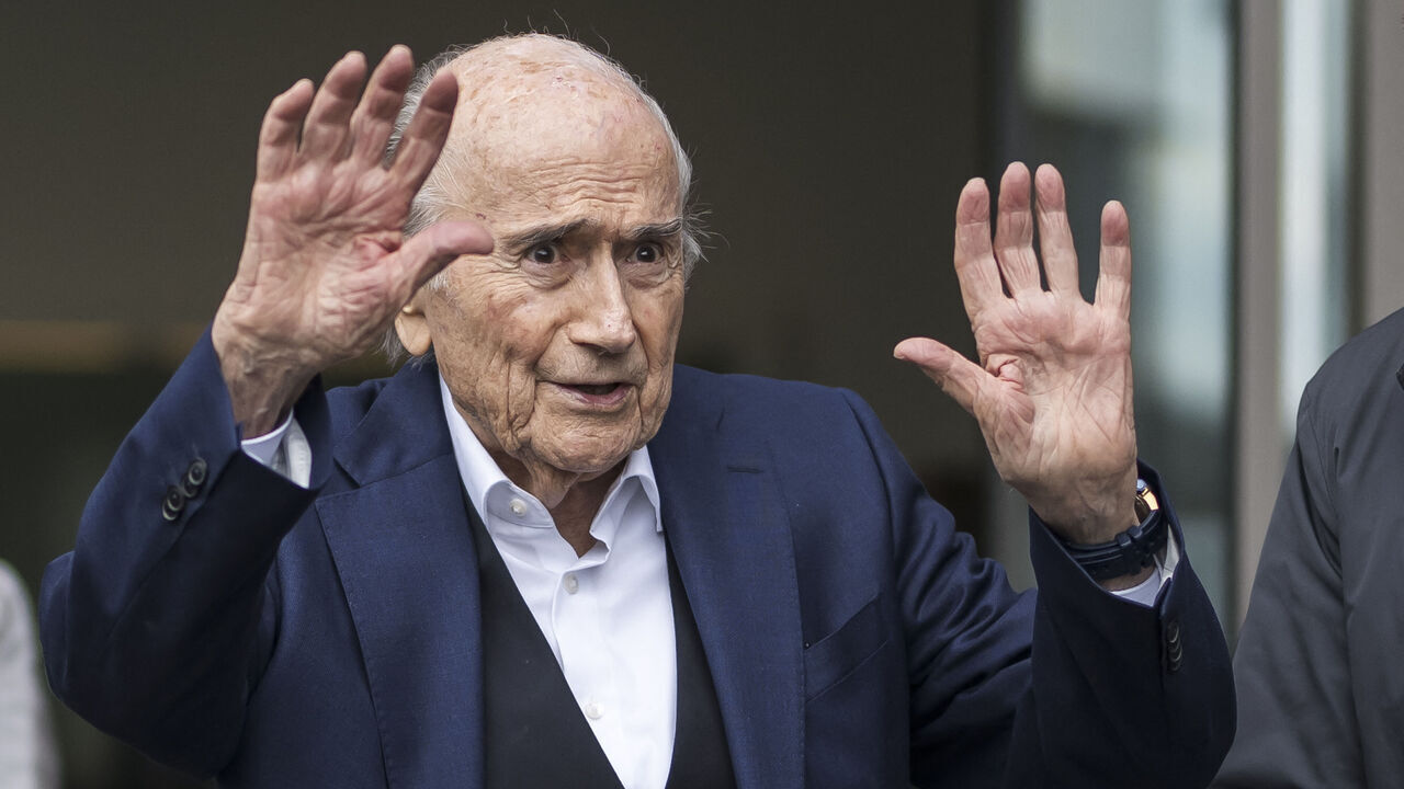 Former FIFA president Sepp Blatter reacts as he leaves the courthouse after the verdict of an appeal by Swiss Attorney General's office against former UEFA and FIFA presidents over a suspected fraudulent payment, in Muttenz near Basel, on March 25, 2025. Former FIFA president Sepp Blatter and ex-UEFA chief Michel Platini were acquitted again on March 25, 2025 on appeal by a Swiss court in a long-running corruption case.