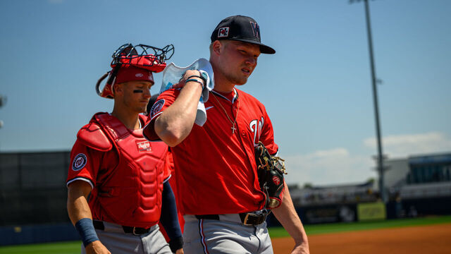 PORT CHARLOTTE, FL - MARCH 13: Washington Nationals starting pitcher DJ Herz with catcher Andrew Knizner seen before a Spring Training baseball game between the Washington Nationals and the Tampa Bay Rays on March 13, 2025 at Charlotte Sports Park in Port Charlotte, Florida.