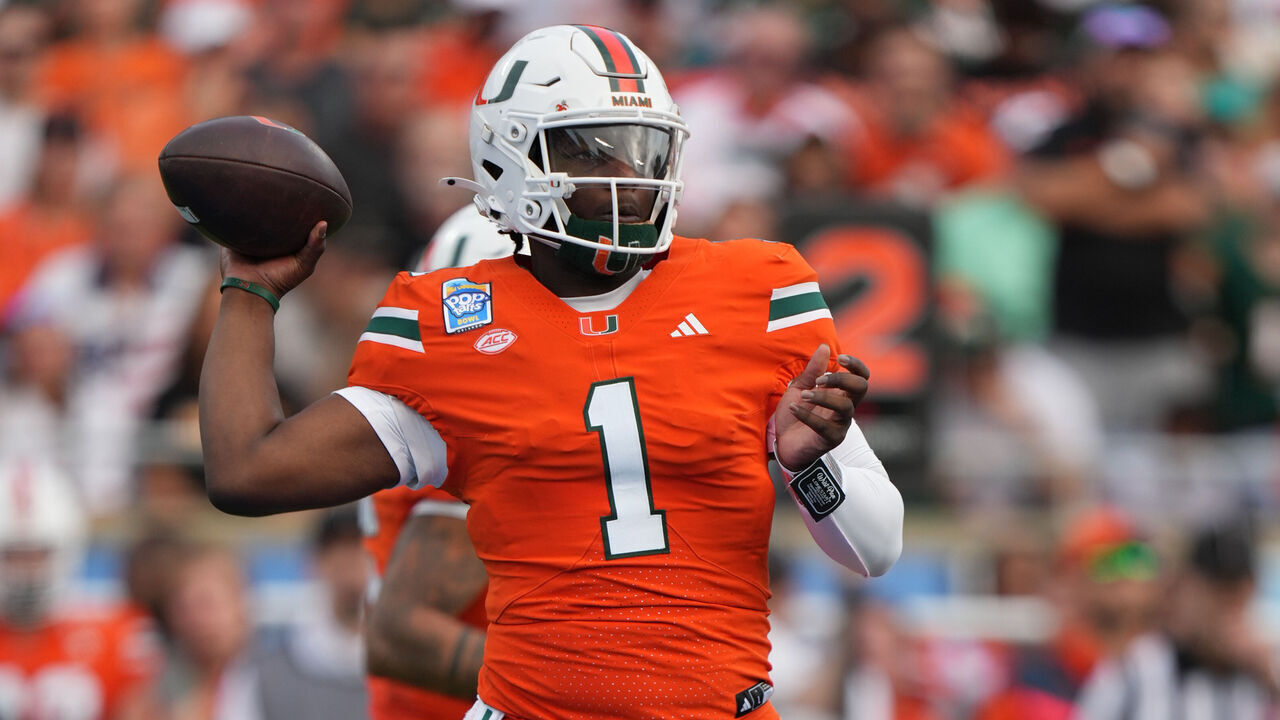 ORLANDO, FL - DECEMBER 28: Miami Hurricanes quarterback Cam Ward (1) makes a pass attempt during the Pop-Tarts Bowl game between the Iowa State Cyclones and the Miami Hurricanes on Saturday, December 28, 2024 at Camping World Stadium in Orlando, Fla.