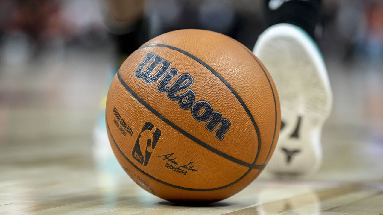 DETROIT, MICHIGAN - JANUARY 09: A detailed view of a Wilson brand official game ball with the NBA logo on the basketball court during the game between the Detroit Pistons and Golden State Warriors at Little Caesars Arena on January 09, 2025 in Detroit, Michigan.