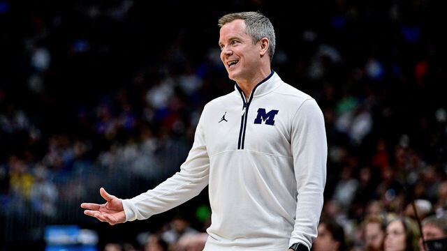 DENVER, COLORADO - MARCH 20: Head coach Dusty May of the Michigan Wolverines reacts in the first half of a game against the UC San Diego Tritons in the first round of the NCAA Men's Basketball Tournament at Ball Arena on March 20, 2025 in Denver, Colorado.
