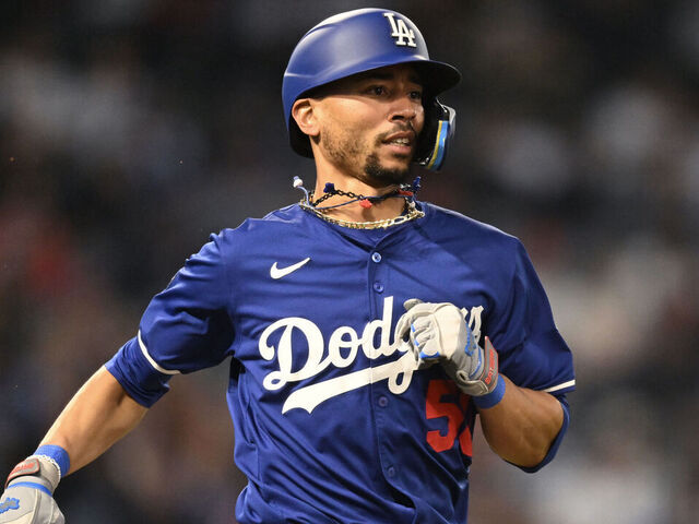 ANAHEIM, CALIFORNIA - MARCH 25: Mookie Betts #50 of the Los Angeles Dodgers grounds out in the sixth inning against the Los Angeles Angels in a spring training game at Angel Stadium of Anaheim on March 25, 2025 in Anaheim, California.