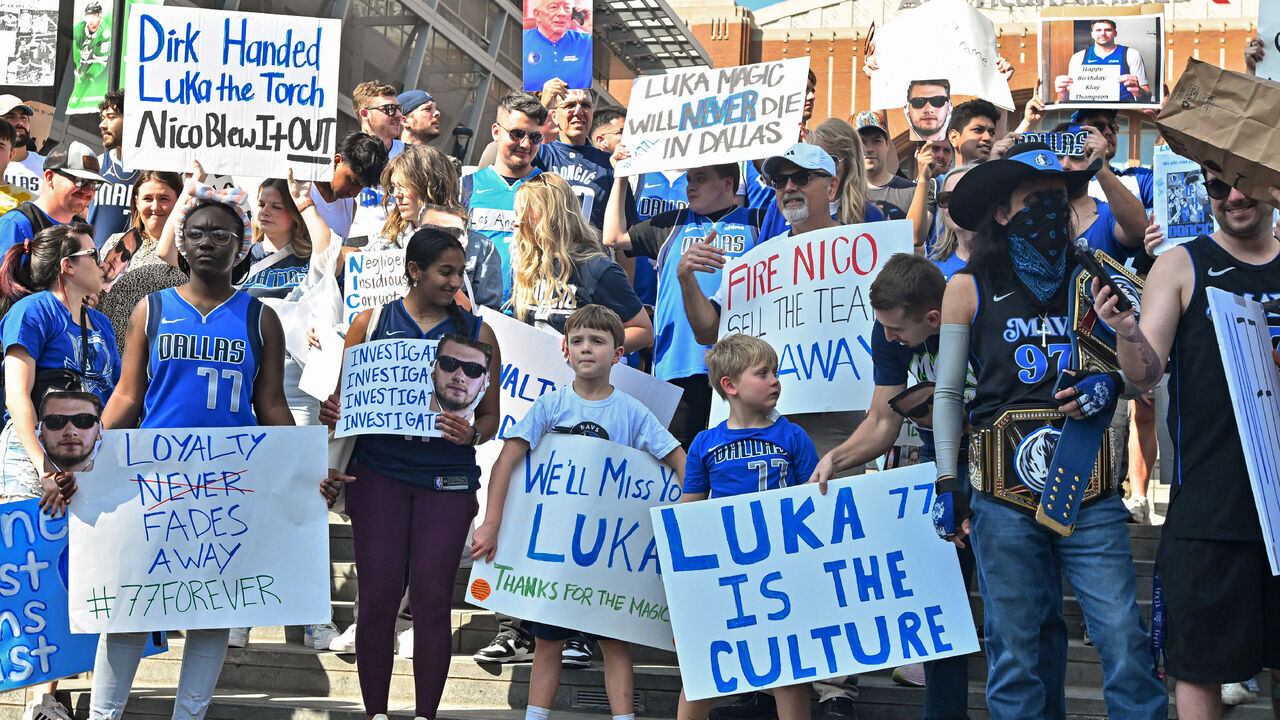 DALLAS, TX - FEBRUARY 08: Dallas Mavericks fans protest the trade of Los Angeles Lakers point guard Luka Doncic outside the American Airlines Center before the start of a NBA game between the Houston Rockets and Dallas Mavericks on Saturday, February 8, 2025 in Dallas, TX.