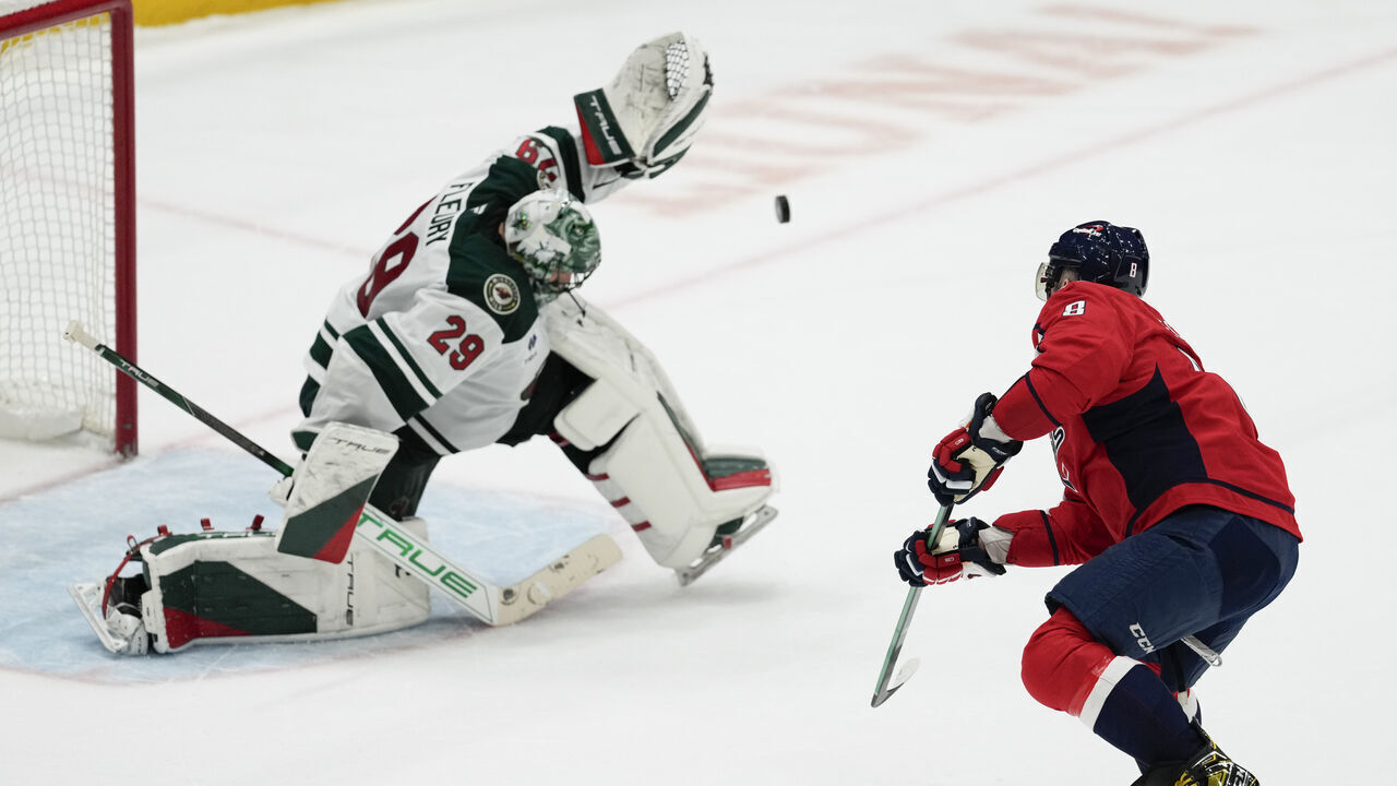 WASHINGTON, DC - JANUARY 02: Marc-Andre Fleury #29 of the Minnesota Wild saves a shot by Alex Ovechkin #8 of the Washington Capitals during a shootout in a game at Capital One Arena on January 02, 2025 in Washington, D.C.