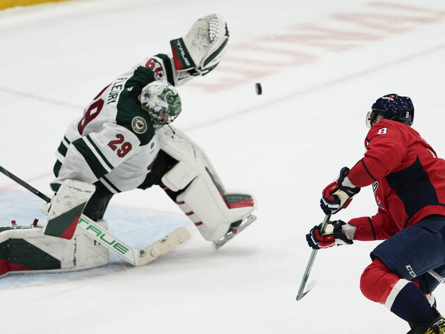 WASHINGTON, DC - JANUARY 02: Marc-Andre Fleury #29 of the Minnesota Wild saves a shot by Alex Ovechkin #8 of the Washington Capitals during a shootout in a game at Capital One Arena on January 02, 2025 in Washington, D.C.