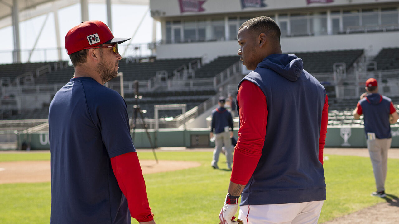 FORT MYERS, FLORIDA - MARCH 6: Alex Bregman #2 of the Boston Red Sox reacts with Rafael Devers #11 of the Boston Red Sox during a Spring Training workout at JetBlue Park at Fenway South in Fort Myers, Florida on March 6, 2025.