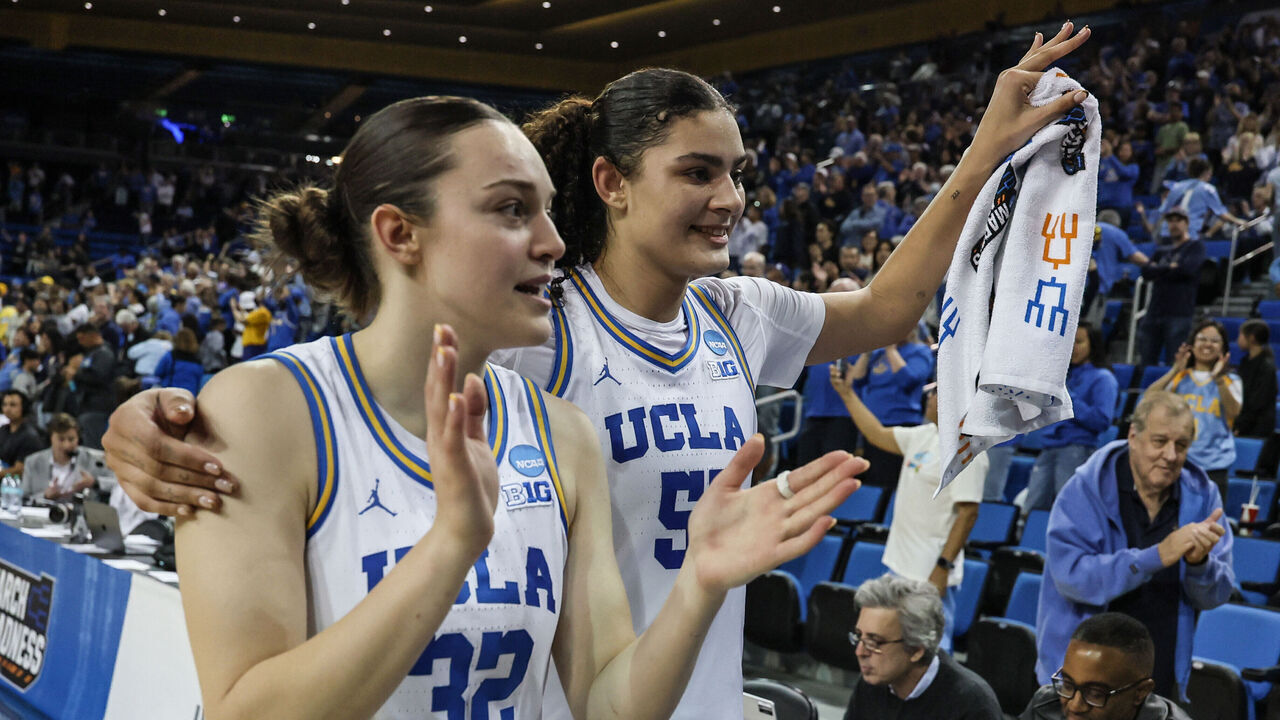 Westwood, CA, Sunday, March 23, 2025 - UCLA Bruins forward Angela Dugalic (32) center Lauren Betts (51) in the second round celebrate a win over Richmond in the second round of the NCAA Women's basketball tournament, at Pauley Pavilion. (Robert Gauthier/Los Angeles Times via Getty Images)