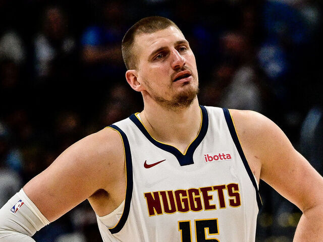 DENVER, COLORADO - MARCH 15: Nikola Jokic #15 of the Denver Nuggets looks on in the second half against the Washington Wizards at Ball Arena on March 15, 2025 in Denver, Colorado.