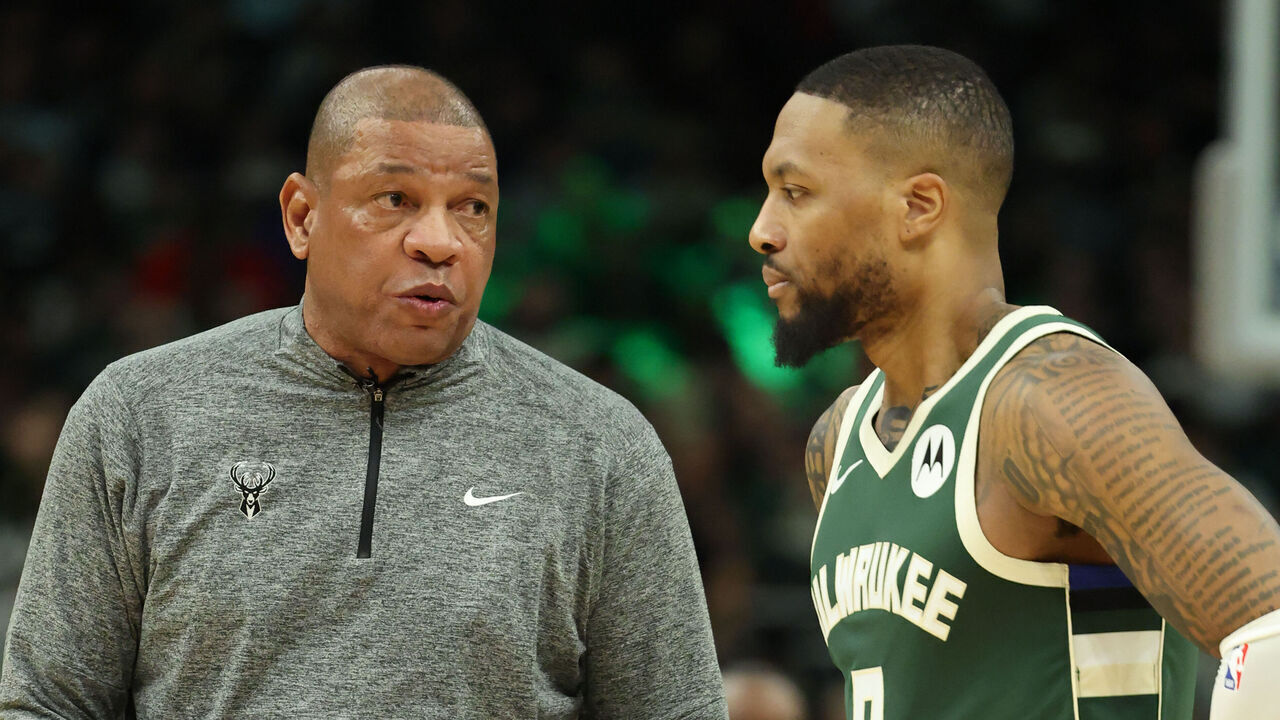 MILWAUKEE, WI - JANUARY 8: Damian Lillard #0 and Head Coach Doc Rivers of the Milwaukee Bucks speak to each other during the game against the San Antonio Spurs on January 8, 2025 at Fiserv Forum Center in Milwaukee, Wisconsin. Mandatory Copyright Notice: Copyright 2025 NBAE .