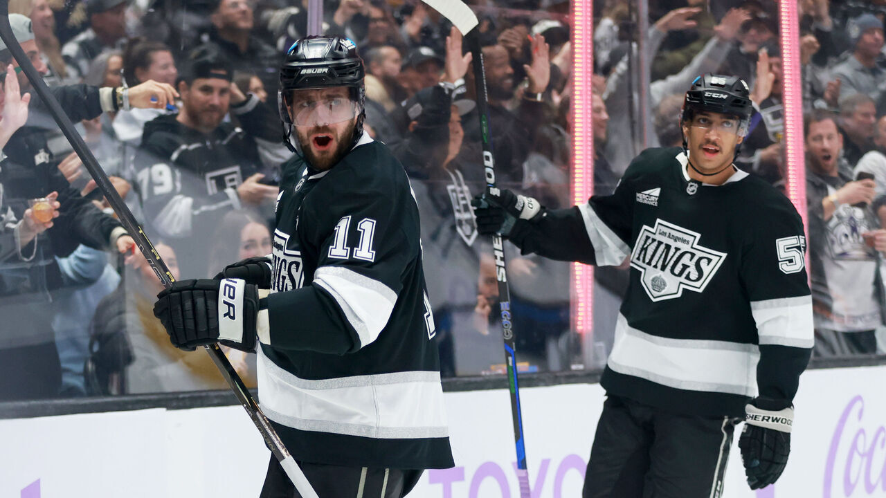 LOS ANGELES, CALIFORNIA - NOVEMBER 27: Anze Kopitar #11 of the Los Angeles Kings celebrates scoring a goal with teammate Quinton Byfield #55 in the first period during the game against the Winnipeg Jets at Crypto.com Arena on November 27, 2024 in Los Angeles, California.