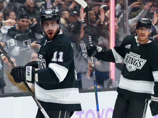 LOS ANGELES, CALIFORNIA - NOVEMBER 27: Anze Kopitar #11 of the Los Angeles Kings celebrates scoring a goal with teammate Quinton Byfield #55 in the first period during the game against the Winnipeg Jets at Crypto.com Arena on November 27, 2024 in Los Angeles, California.