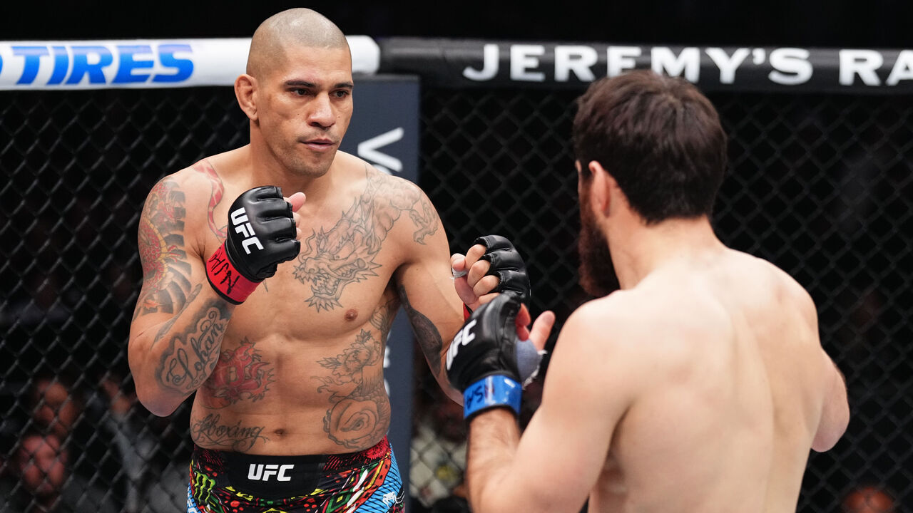 LAS VEGAS, NEVADA - MARCH 08: (L-R) Alex Pereira of Brazil faces Magomed Ankalaev of Russia in the UFC light heavyweight championship fight during the UFC 313 event at T-Mobile Arena on March 08, 2025 in Las Vegas, Nevada.