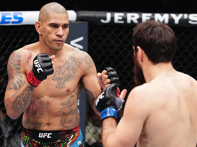 LAS VEGAS, NEVADA - MARCH 08: (L-R) Alex Pereira of Brazil faces Magomed Ankalaev of Russia in the UFC light heavyweight championship fight during the UFC 313 event at T-Mobile Arena on March 08, 2025 in Las Vegas, Nevada.