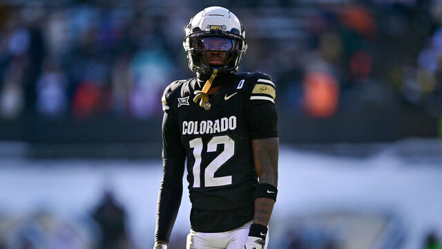 BOULDER, CO - NOVEMBER 29: Travis Hunter #12 of the Colorado Buffaloes looks on as he plays against the Oklahoma State Cowboys in the first quarter at Folsom Field on November 29, 2024 in Boulder, Colorado.