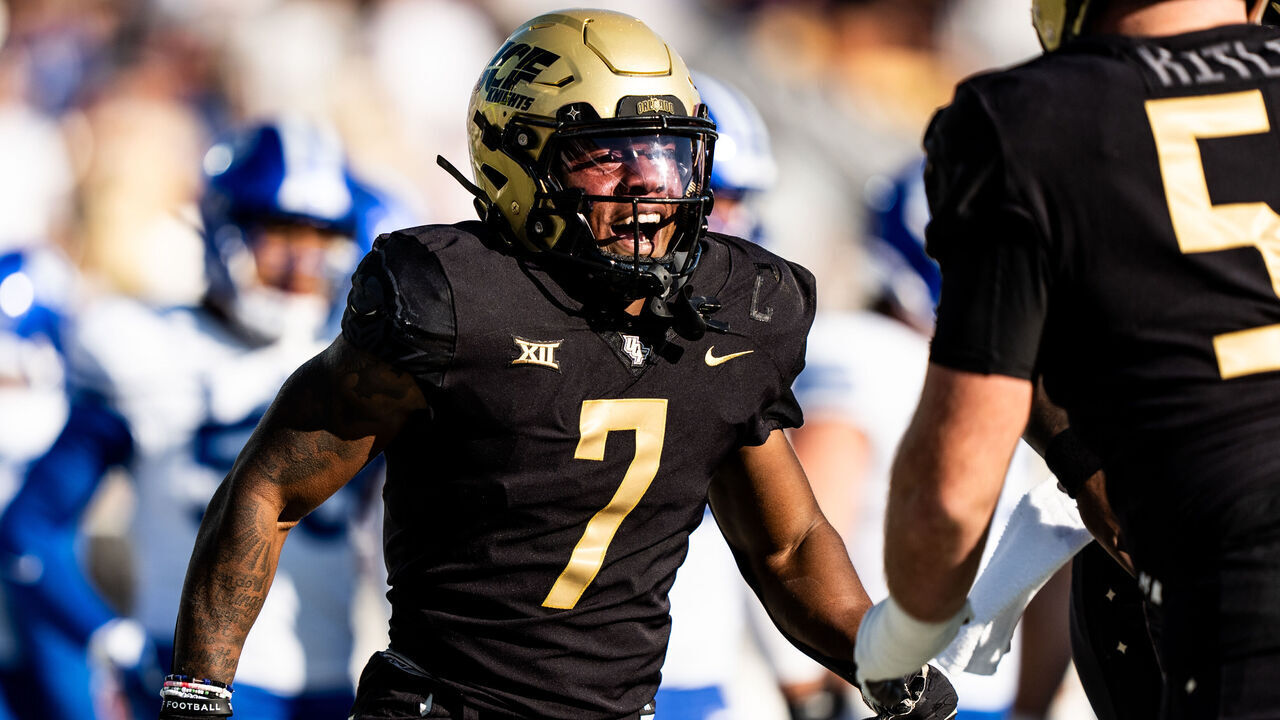 ORLANDO, FLORIDA - OCTOBER 26: RJ Harvey #7 of the UCF Knights celebrates after a touchdown against the Brigham Young Cougars at FBC Mortgage Stadium on October 26, 2024 in Orlando, Florida.