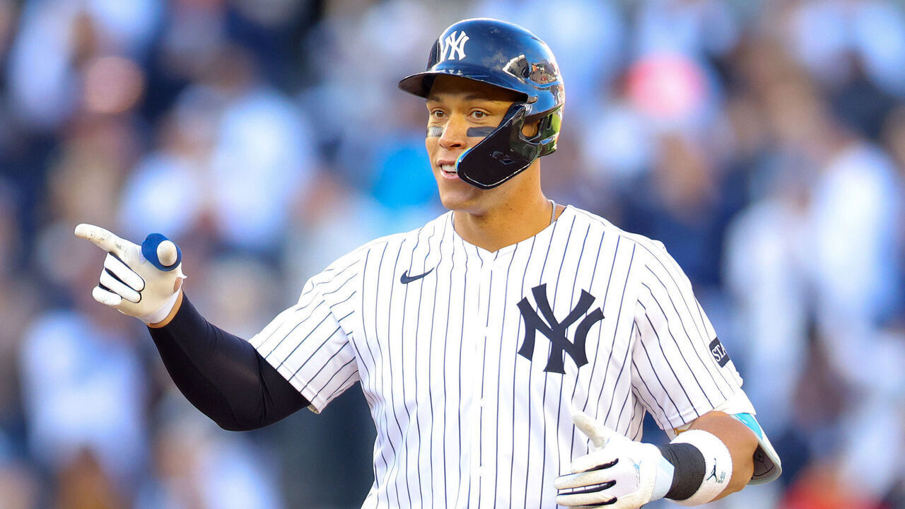 NEW YORK, NEW YORK - MARCH 27: Aaron Judge #99 of the New York Yankees reacts after hitting a an RBI double in the seventh inning against the Milwaukee Brewers on Opening Day at Yankee Stadium on March 27, 2025 in New York City.