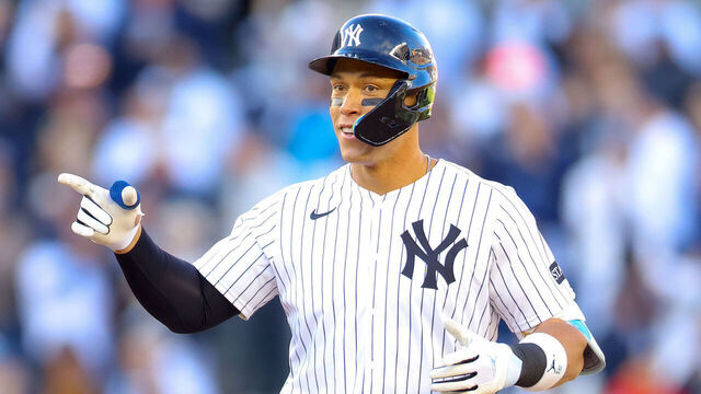 NEW YORK, NEW YORK - MARCH 27: Aaron Judge #99 of the New York Yankees reacts after hitting a an RBI double in the seventh inning against the Milwaukee Brewers on Opening Day at Yankee Stadium on March 27, 2025 in New York City.