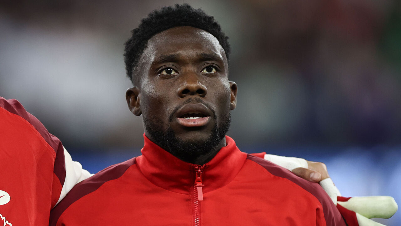 INGLEWOOD, CALIFORNIA - MARCH 20: Alphonso Davies #19 of Canada stands for his national anthem before to the Concacaf Nations League Semifinal match between Canada and Mexico at SoFi Stadium on March 20, 2025 in Inglewood, California.