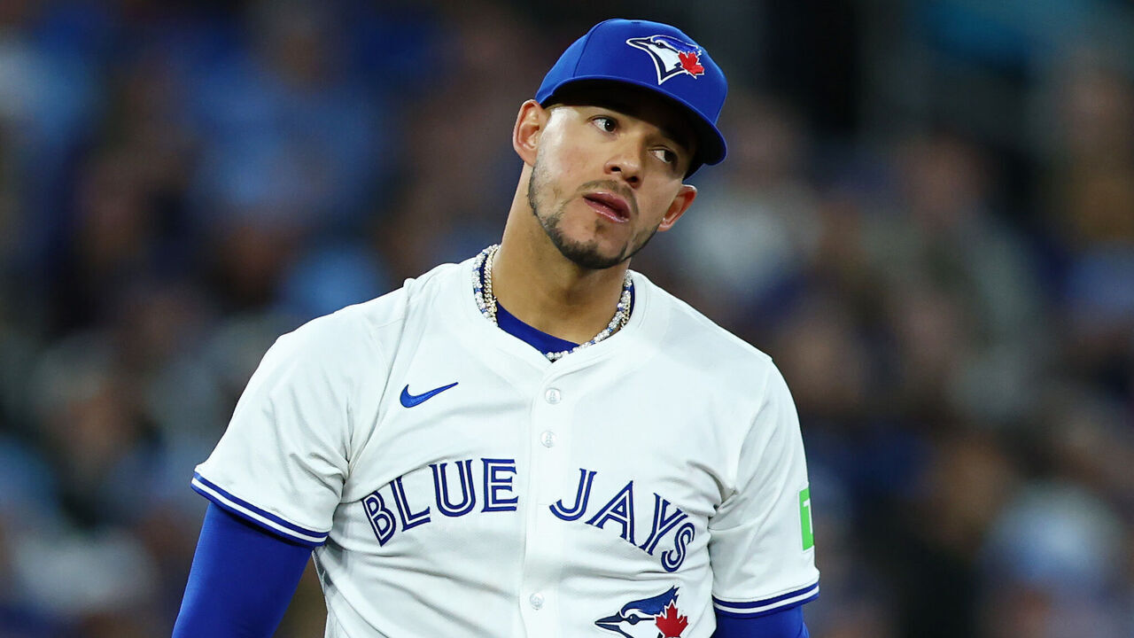 TORONTO, ONTARIO - MARCH 27: José Berríos #17 of the Toronto Blue Jays reacts against the Baltimore Orioles during the first inning on Opening Day at Rogers Centre on March 27, 2025 in Toronto, Ontario.