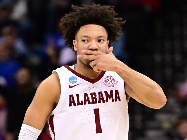 NEWARK, NEW JERSEY - MARCH 27: Mark Sears #1 of the Alabama Crimson Tide reacts after shooting a three-point basket during the second half of the game against the Brigham Young Cougars of the Sweet Sixteen round of the 2025 NCAA Men's Basketball Tournament held at Prudential Center on March 27, 2025 in Newark, New Jersey.