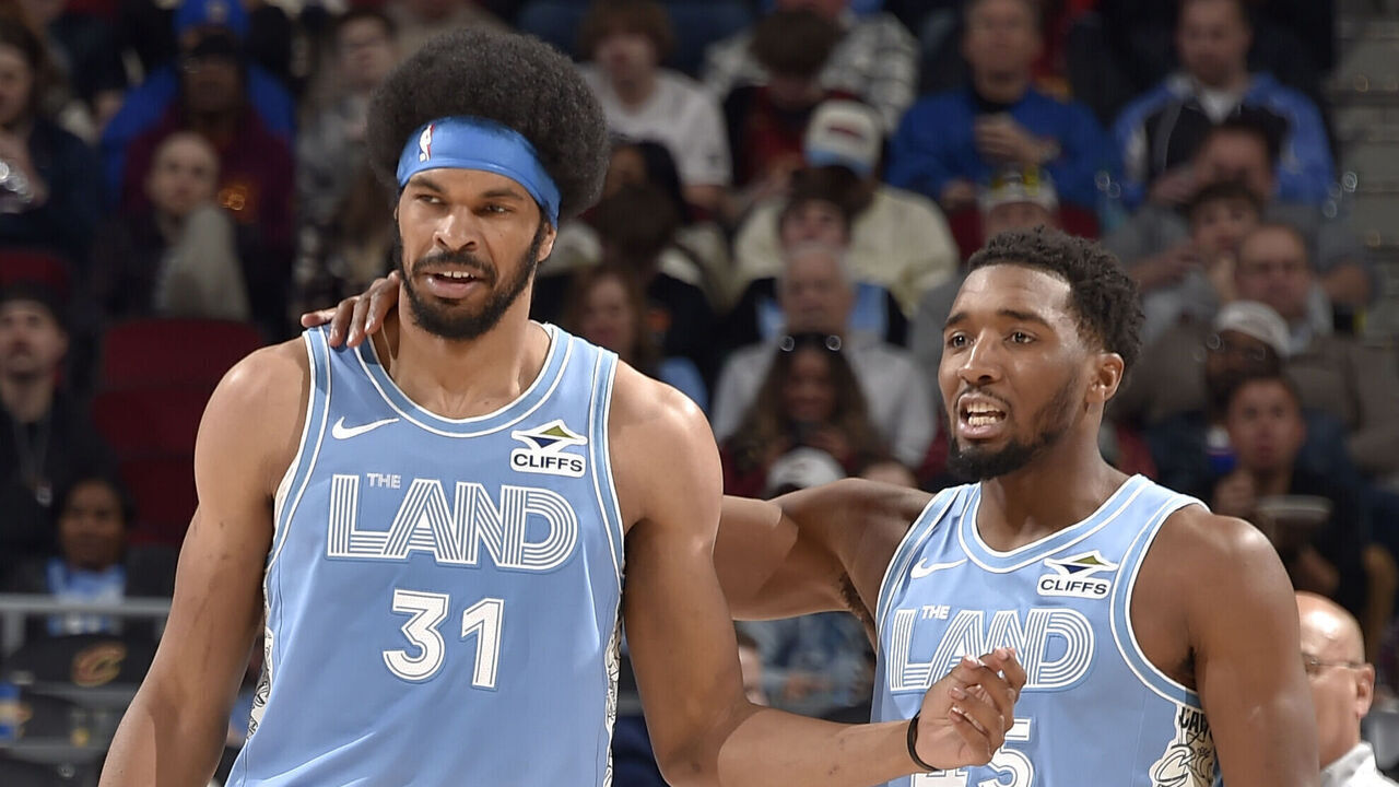 CLEVELAND, OH - MARCH 27: Jarrett Allen #31 and Donovan Mitchell #45 of the Cleveland Cavaliers embrace during the game against the San Antonio Spurs on March 27, 2025 at Rocket Arena in Cleveland, Ohio. NOTE TO USER: User expressly acknowledges and agrees that, by downloading and/or using this Photograph, user is consenting to the terms and conditions of the Getty Images License Agreement. Mandatory Copyright Notice: Copyright 2025 NBAE