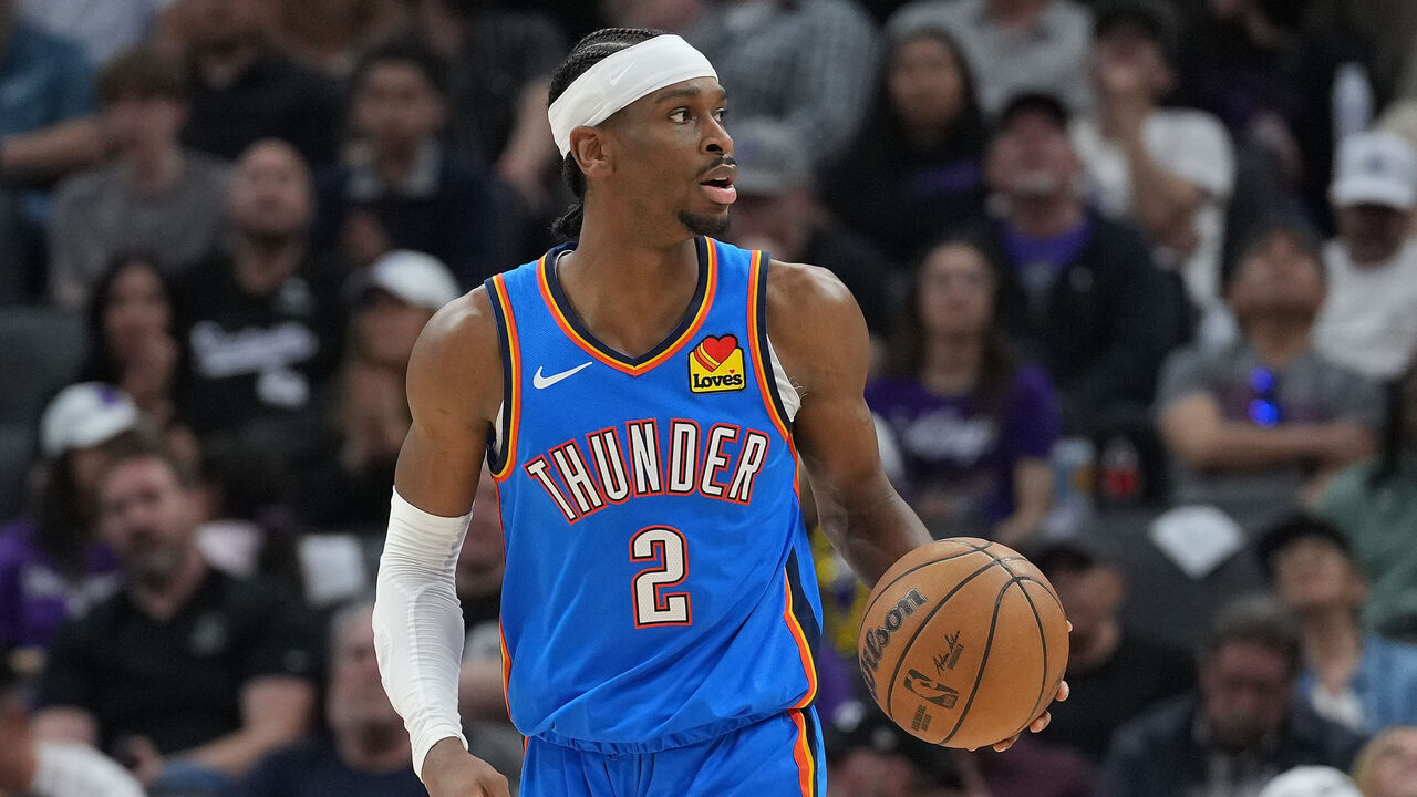 SACRAMENTO, CALIFORNIA - MARCH 25: Shai Gilgeous-Alexander #2 of the Oklahoma City Thunder dribbles the ball up court against the Sacramento Kings during the first half of an NBA basketball game at Golden 1 Center on March 25, 2025 in Sacramento, California.