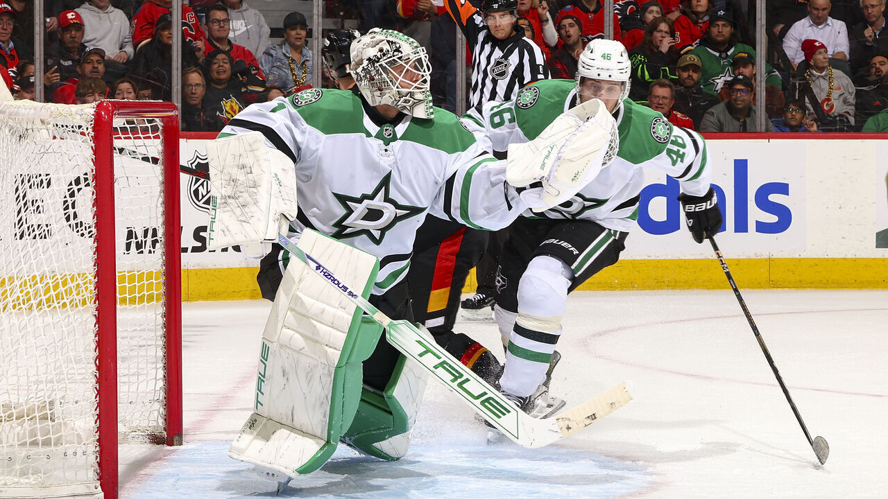 CALGARY, AB - MARCH 27: Casey DeSmith #1 of the Dallas Stars makes a save against the Calgary Flames at Scotiabank Saddledome on March 27, 2025 in Calgary, Alberta, Canada.