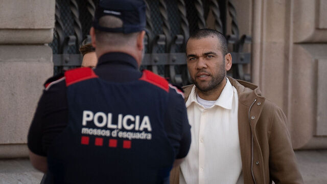 BARCELONA CATALONIA, SPAIN - MARCH 28: Ex-footballer Dani Alves and his lawyer, Ines Guardiola, on his arrival at the Barcelona Court, on 28 March, 2024 in Barcelona, Catalonia, Spain. The footballer Dani Alves has appeared today before the Audiencia of Barcelona for the first of the weekly appearances he will have to make while he remains on probation to certify that he has not absconded. Alves has arrived accompanied by his lawyer, for this procedure that he must do every Friday (this week a day earlier, because it is a holiday on Good Friday) while he remains at liberty until his conviction for sexual assault is final. The footballer was released from pre-trial detention on Monday after paying a bail of one million euros, and the court also set as a requirement to his freedom while awaiting final judgment and will appear every week in court to check that he has not left Spain.