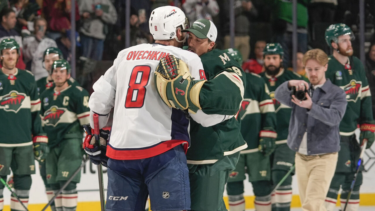 SAINT PAUL, MN - MARCH 27: Marc-Andre Fleury #29 of the Minnesota Wild and Alex Ovechkin #8 of the Washington Capitals share a moment following the game at the Xcel Energy Center on March 27, 2025 in Saint Paul, Minnesota.